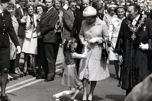 In a proud and memorable moment, Blackpool youngster Donna Lightbown meets the Queen in 1977 during her Silver Jubilee tour