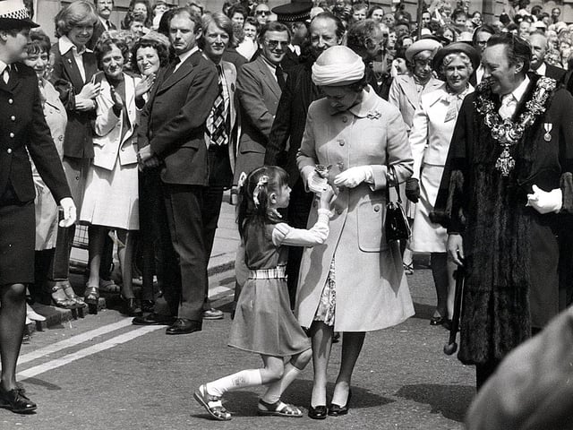 In a proud and memorable moment, Blackpool youngster Donna Lightbown meets the Queen in 1977 during her Silver Jubilee tour
