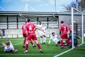 Siya Ligendza pokes home the opening goal for AFC Fylde. Photo: Steve McLellan