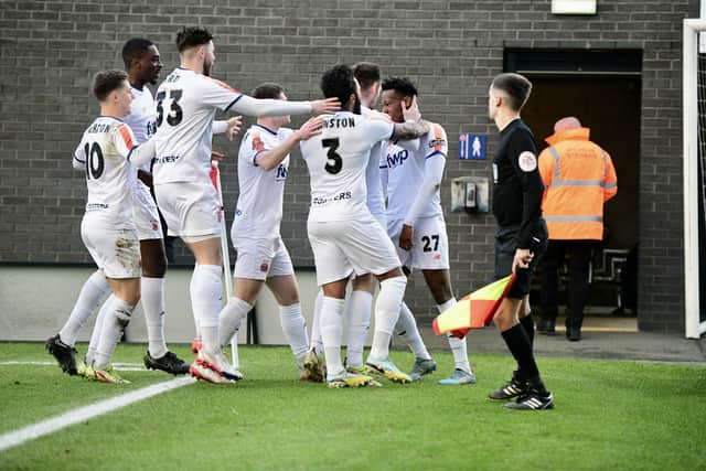 It all started so well for AFC Fylde as players celebrate the opening goal by Siya Ligendza (far right)   Picture: STEVE MCLELLAN