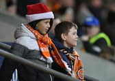 Seasiders supporters braved the windy conditions to watch the 3-0 victory over Carlisle United.