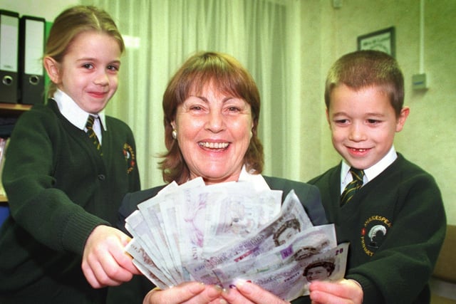 Schools in Fylde and Wyre were celebrating after the announcement of an eight percent rise in funding. Picture shows head of Shakespeare School in Fleetwood, Margaret Lund, being helped to count the money by six-year-olds Leah Dawe and Liam Anyon
