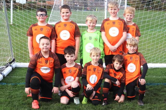 The YMCA Blacks players Photo: Karen Tebbutt