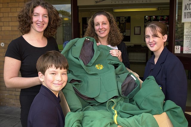 Bispham High School teachers Louise Gilbert and Tammy Gidman were collecting old school uniforms to send to Romania after they spent the summer there working with the charity Musika. Also pictured are Joe Wood (11) and Emma Kenyon (13)