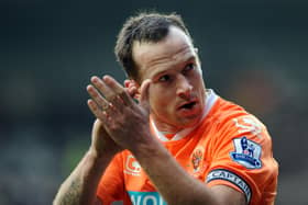 BLACKPOOL, ENGLAND - JANUARY 22:  Charlie Adam of Blackpool applauds the supporters during the Barclays Premier League match between Blackpool and Sunderland at Bloomfield Road on January 22, 2011 in Blackpool, England.  (Photo by Chris Brunskill/Getty Images)