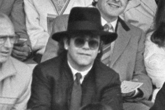 Elton John sits in the crowds at Bloomfield Road to watch Keith Mercer's testimonial match