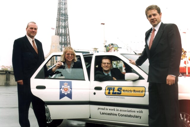 Bill Kerr and Alison Hilton of TLS Blackpool hand over the new vehicle to Blackpool police officers Detective Constable Russ Lawson and Detective Inspector Kevin Toole, 1998
