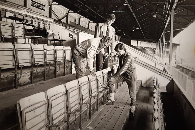 Taking out seats in the stand in 1985