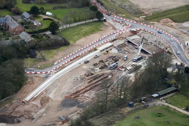 A new bridge is being built to carry Lodge Lane (running south to north in this image) over the new A585 dual carriageway bypass