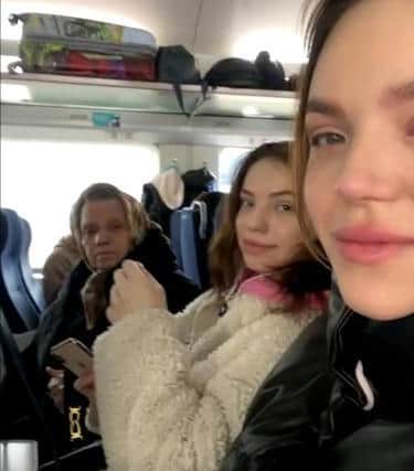 Bogdana, Sonia and their grandmother on the train to Poland