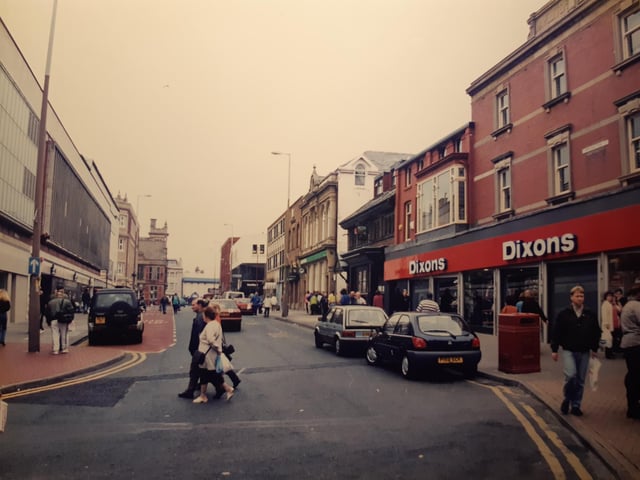 Corporation Street with Dixons on the corner. Remember when we could just pop into town to buy a telly?