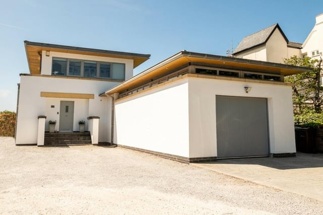 This stunning seafront home on Clifton Drive in Lytham is on the market for £1,850,000 with Lytham Estate Agents. It has multiple balconies and a gym/studio.