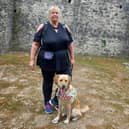 Nicky Askew with guide dog Unity.
