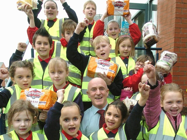 Warburtons Business Development Manager Mike Mason with Revoe Primary School (Blackpool) pupils and their new Hi-Viz jackets, 2009