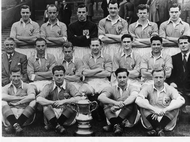The 1953 FA Cup winning Blackpool team, including the likes of Harry Johnston (captain), George Farm (goalkeeper), Cyril Robinson, manager Joe Smith, Stanley Matthews, Stan Mortensen, Jackie Mudie and Bill Perry