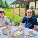 Gillian and Mike enjoy lunch in the garden