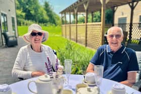 Gillian and Mike enjoy lunch in the garden