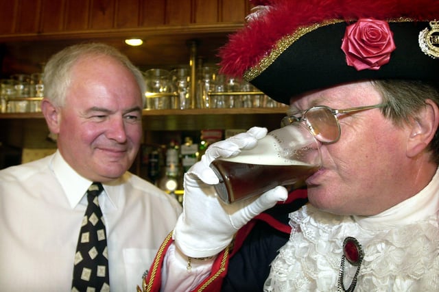 The Mitre pub on West Street in Blackpool marked its centenary with a visit from town crier Barry McQueen and members of the Civic Trust dressed in Victorian costume, 2002