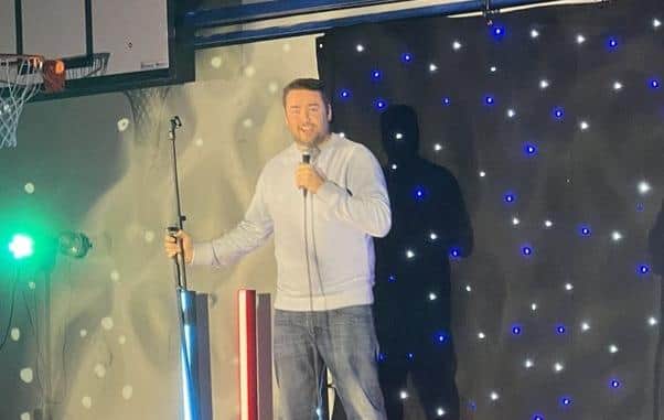 Jason Manford on stage at South Shore Academy