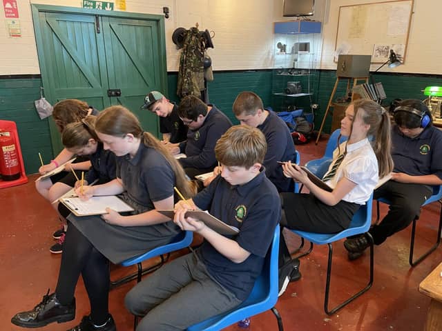 Pupils taking part in a codes and cyphers session in the Operations Room at the Spitfire Centre
