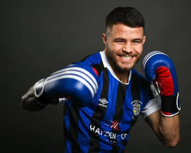 Hulme, a former pro boxer, signed pro terms with Irish side Athlone Town in January