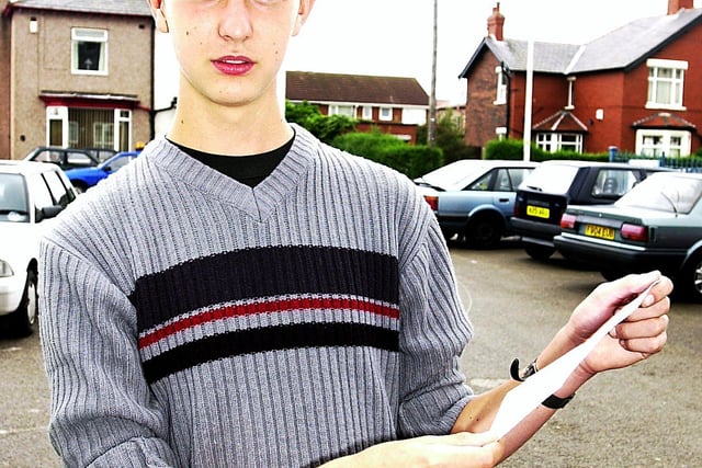 Chris Boehme with his A-level results at Fleetwood High School, 2001