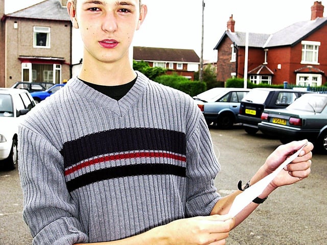 Chris Boehme with his A-level results at Fleetwood High School, 2001