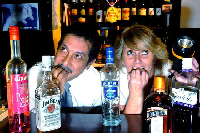 The Saddle Inn, Whitegate Drive. Pictured with some of the resident "spirits" are manager Janet Ingleson and assistant manager David Ali. The story was about the pub being haunted