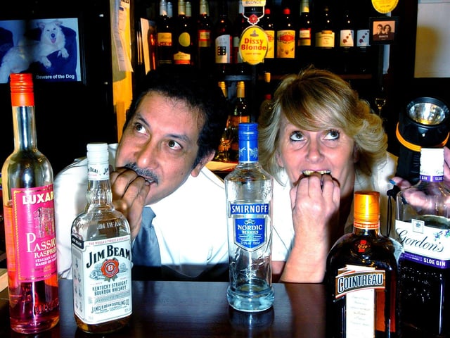 The Saddle Inn, Whitegate Drive. Pictured with some of the resident "spirits" are manager Janet Ingleson and assistant manager David Ali. The story was about the pub being haunted