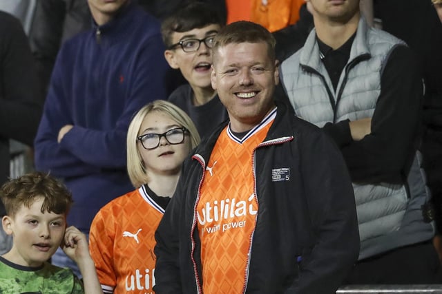 A Blackpool fan enjoys a smile during the game