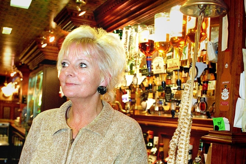 Landlady of The Station on Talbot Road, Blackpool, rings time in 1998