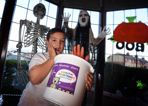 Bailey Wood, 11, from Blackpool, inside his house of horrors