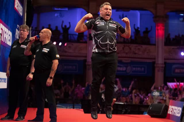 Gerwyn Price celebrates victory over Dave Chisnall Picture: Taylor Lanning/PDC