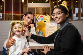 Amy Childs visits McDonald’s with her daughter Polly to have their faces painted. Photo: PA