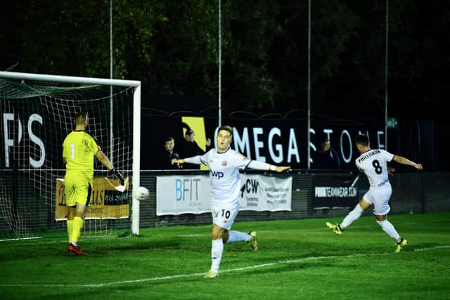 Nick Haughton scores his second goal from the penalty spot in AFC Fylde's FA Cup win at Farsley Celtic   Picture: STEVE MCLELLAN