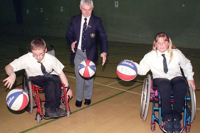 Blackpool Sports Council chairman John Horan plays basketball with Highfield High School pupils Rochelle Woods and Richard Spencer in 1999