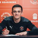 Daniels signed his first professional contract in February
