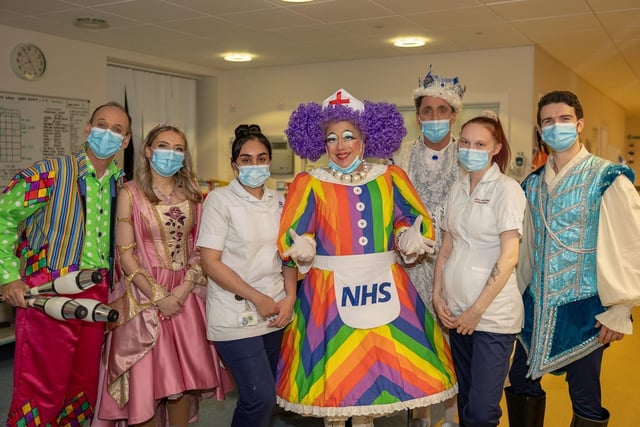 The cast of Blackpool Grand Theatre's Sleeping Beauty panto with children's ward staff at Blackpool Victoria Hospital.