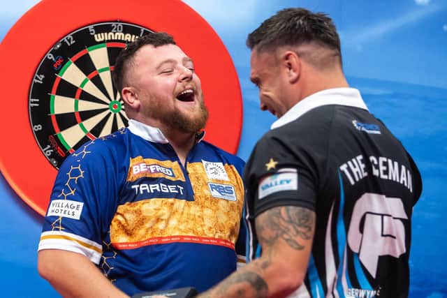 Josh Rock saw off Gerwyn Price to reach the Betfred World Matchplay semi-finals at the Winter Garden Photo: Taylor Lanning/PDC