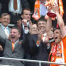 Team captain Michael Jackson lifts the cup after Blackpool beat Yeovil in the League One play-off final at Wembley. In 2008 he transferred to Shewsbury Town and his latest signing was interim manager of Burnley U23s