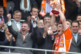 Team captain Michael Jackson lifts the cup after Blackpool beat Yeovil in the League One play-off final at Wembley. In 2008 he transferred to Shewsbury Town and his latest signing was interim manager of Burnley U23s