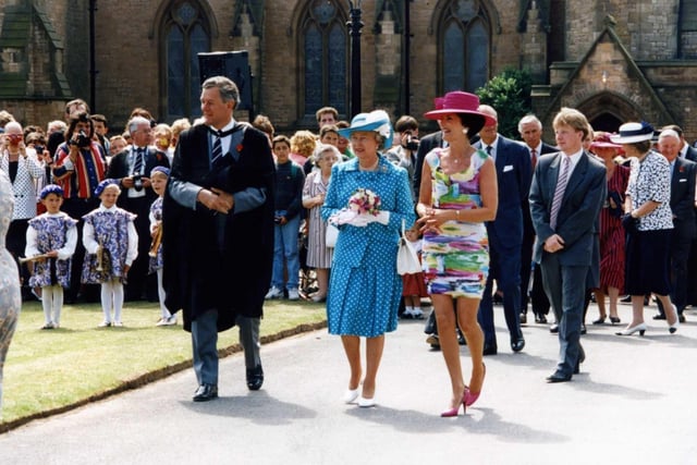 The Queen at Rossall School with teacher Vivien Ivell and headmaster Richard Rhodes
