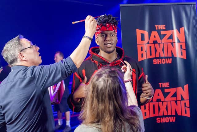 Principal sculptor Stephen Mansfield and senior colour artist Amanda Tremewan from Madame Tussauds put the finishing touches to KSI’s waxwork figure at The O2