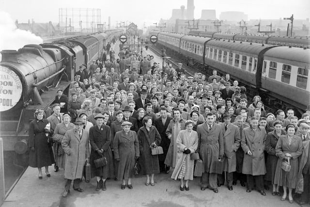 Guests arrive at Blackpool Central Station for the town's biggest ever party held at the Winter Gardens by Dutch multi-millionaire Barnhard Van Leer to celebrate his 71st birthday. The 2000 British workers and their guests attended a variety show in the afternoon prior to the evening party. The date was 1955