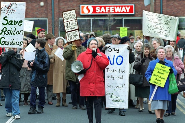 This was 1998 when protestors marched against plans for a new Safeway development. The existing store is in the background