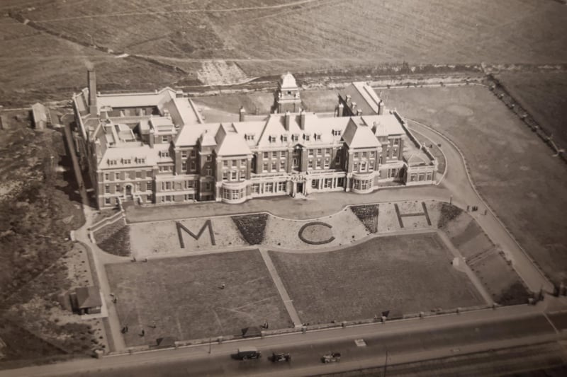 Sadly this is undated but provides a fascinating photo from the air - the surrounding land was completely undeveloped. Picture: Surrey Flying Services