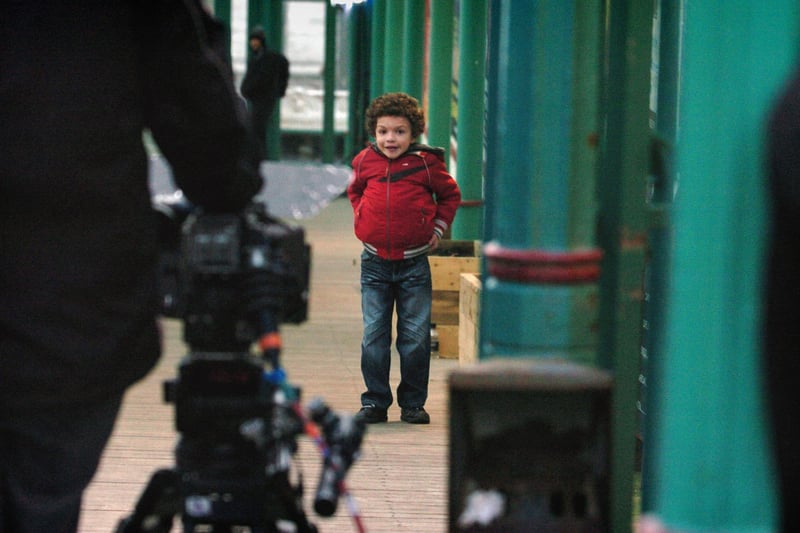 This was North Pier in 2010 when a camera crew were filming a storyline involving the disappearance of Simon Barlow (played by Alex Bain).
Alex waits for his cue to 'escape'