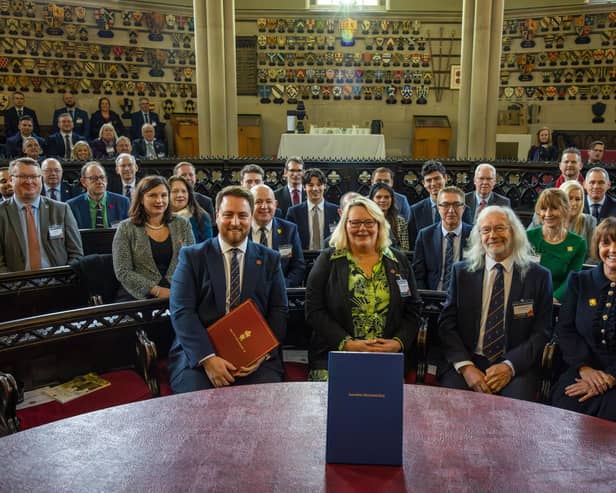 [From left] Levelling Up Minister Jacob Young,  Blackpool Council leader Lynn Williams, Blackburn with Darwen Council leader Phil Riley, Lancashire County Council leader Phillippa Williamson and, behind them, their respective government and council teams at the devolutionn deal signing ceremony at Lancaster Castle (image: Martin Bostock Photography)