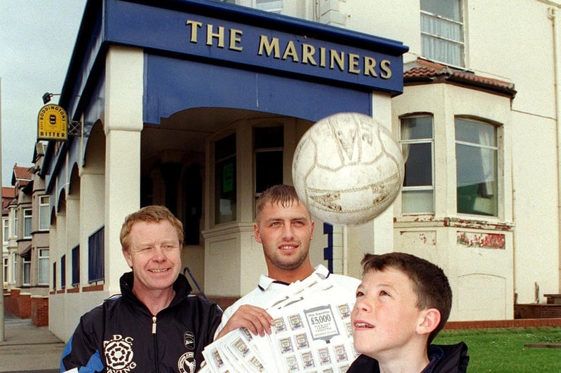 The Mariners at Norbreck in 1997. This photo was for a fund raising event to raise money for Blackpool Junior Football Federation. Malcolm Dugdale (left), manager of BJFF U14 team, pictured with son Wayne and Mariners manager Phil McQuillan