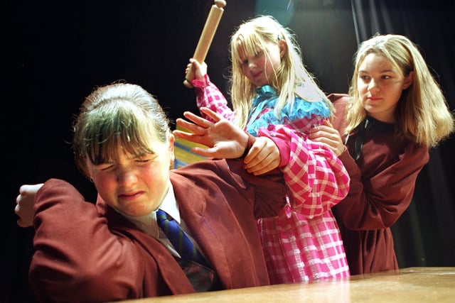 A dress rehearsal scene from the the production of "Smike". From left, Vikki Baker, Nella Tingle and Natalie Charlesworth.